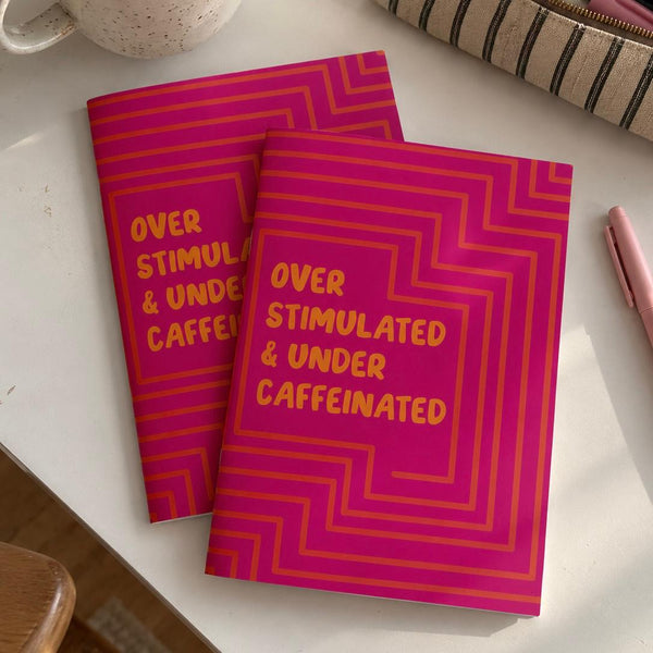 Over Stimulated Soft Cover Notebook